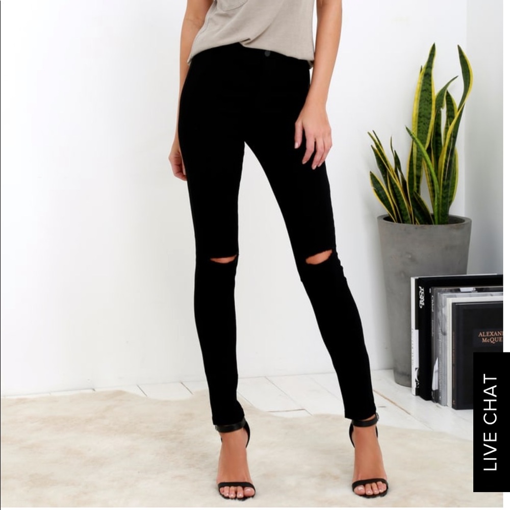 Black high waisted ripped skinny jeans